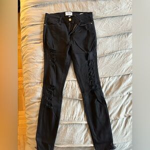 Black frame skinny jeans, ripped with raw hem, size 29